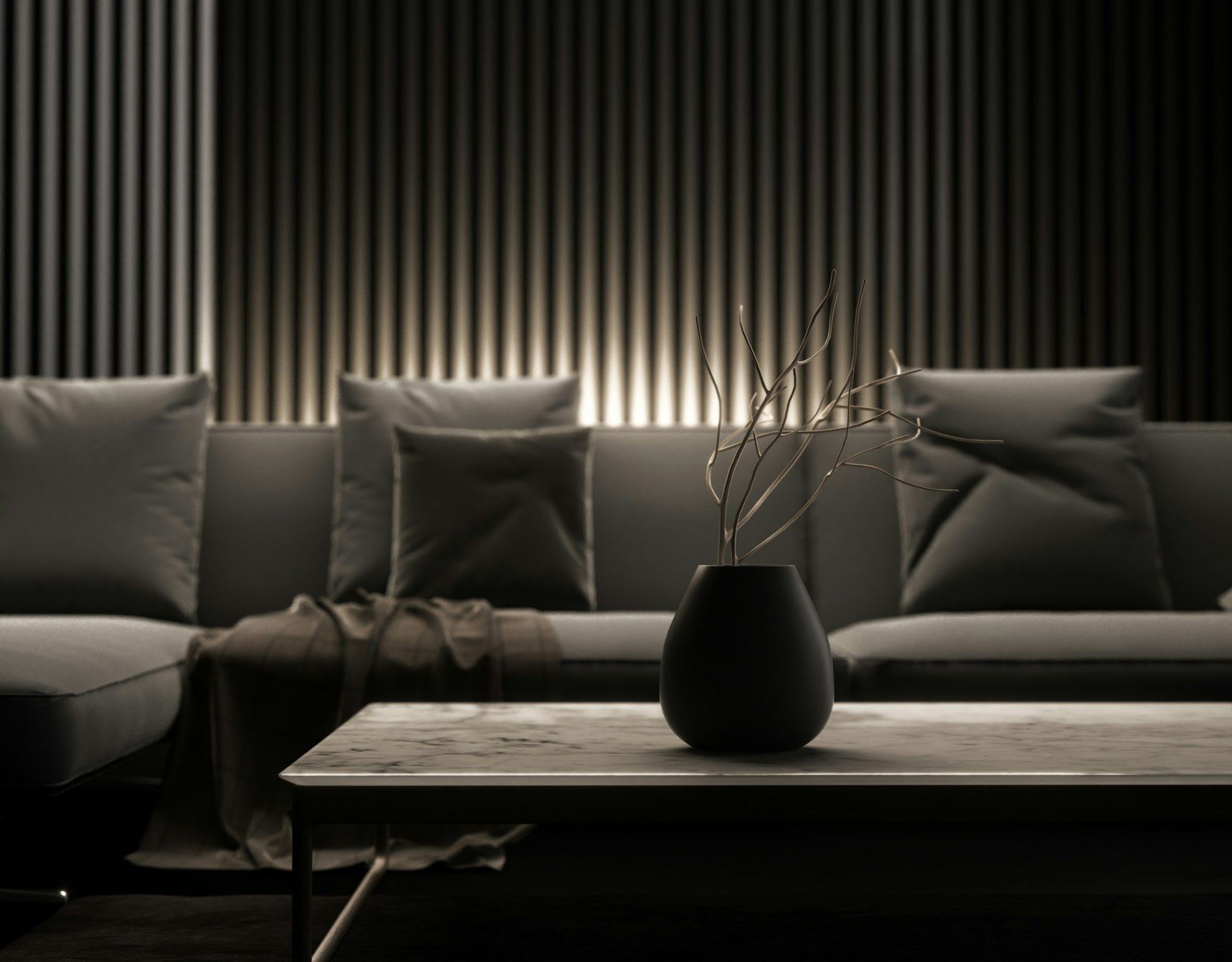 Salon minimaliste aux tons sombres